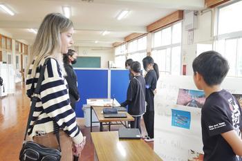 Maria listened to Local Kids' presentation.jpg